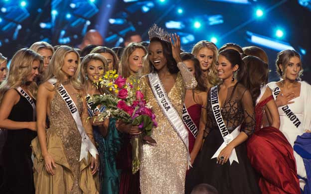 Miss District of Columbia Deshauna Barber smiles after being crowned Miss USA during the 2016 Miss USA pageant in Las Vegas, Sunday, June 5, 2016. (Jason Ogulnik/Las Vegas Review-Journal via AP) LOCAL TELEVISION OUT; LOCAL INTERNET OUT; LAS VEGAS SUN OUT
